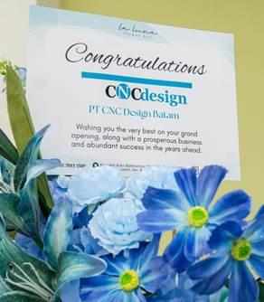 Message in flowers at opening of Batam Island distribution centre